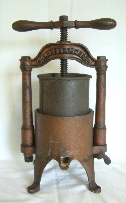 antique cast iron juicer